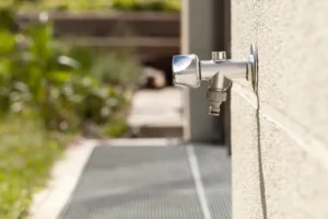%Title% | 3 Mountains Home Services a frost free spigot extends from the outside wall of a home.