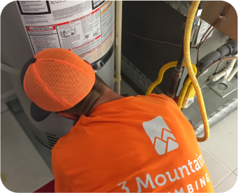Tech working on hot water heater